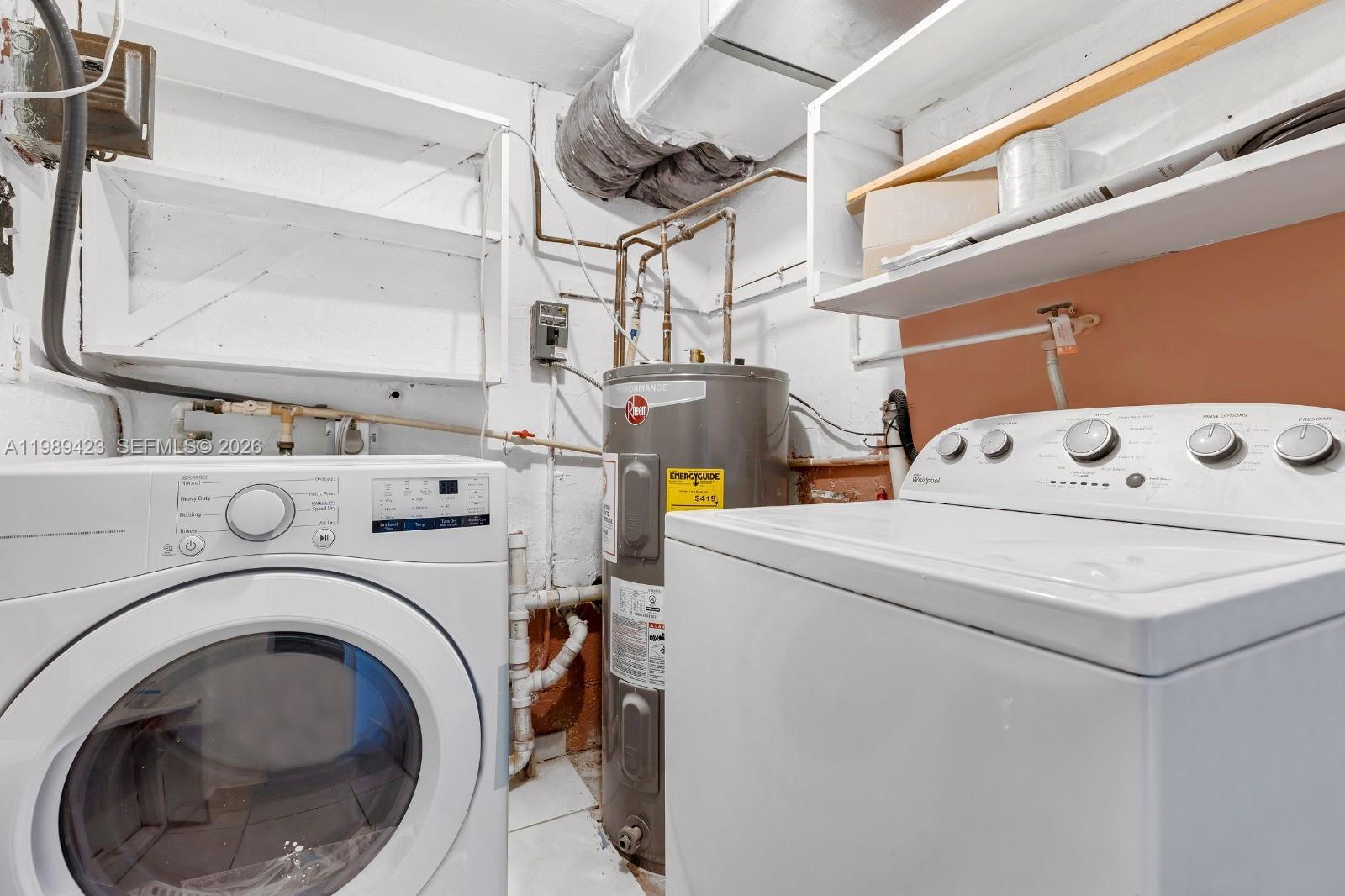 38 Miami Gardens Road West Park, FL 33023 - Photo 22 of 30 a utility room with dryer and washer