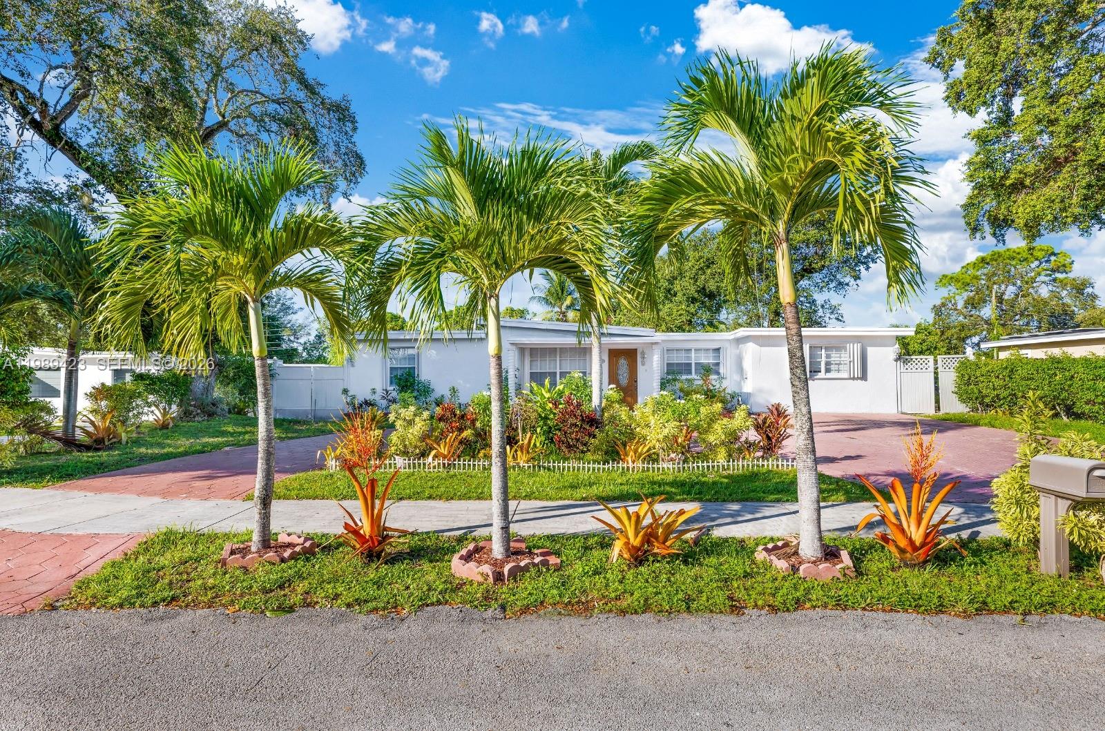 38 Miami Gardens Road West Park, FL 33023 - Photo 3 of 30 a view of a chair and table in the garden