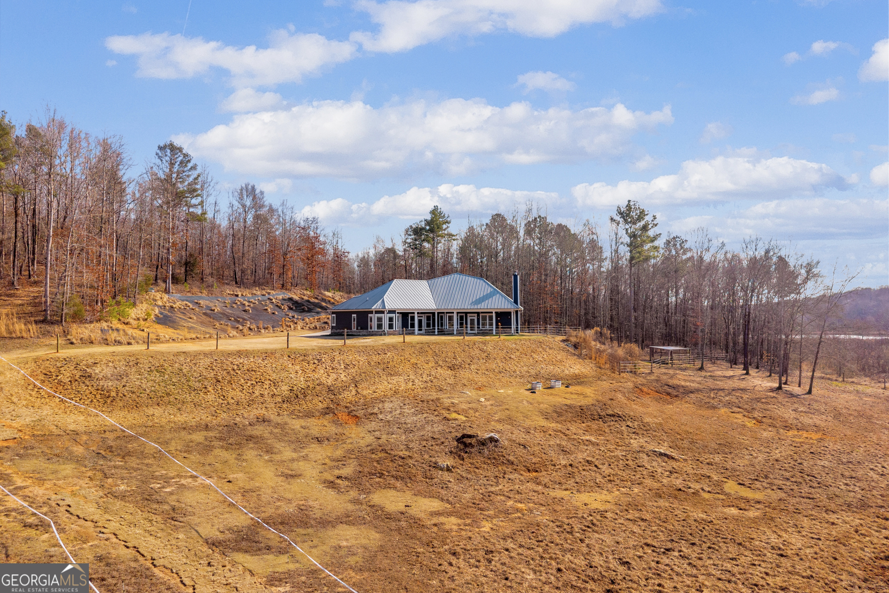249 Hunters Creek Trail Toccoa, GA 30577 - Photo 107 of 110 a view of a yard with snow on the road