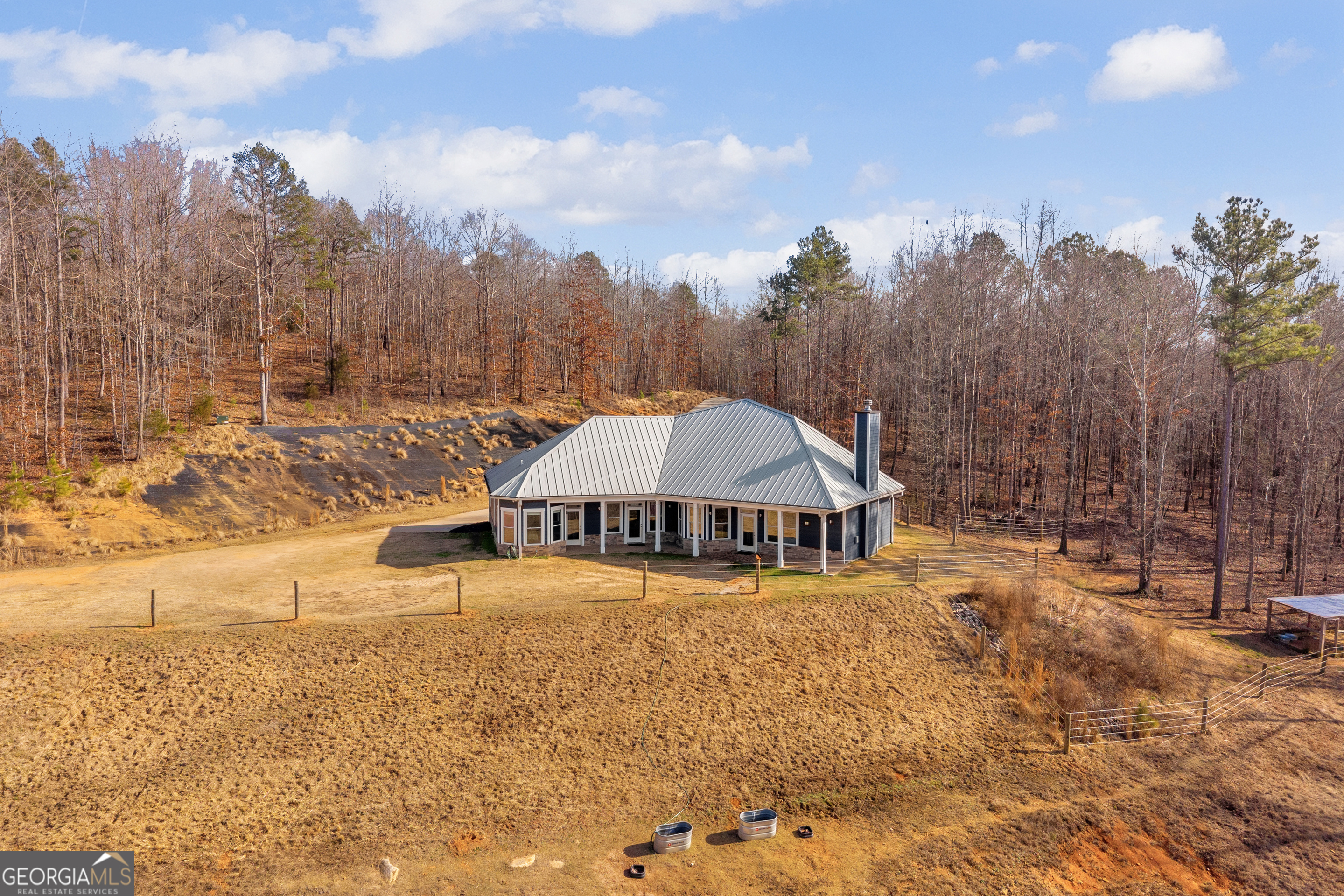 249 Hunters Creek Trail Toccoa, GA 30577 - Photo 109 of 110 a view of a house with a yard and covered with snow