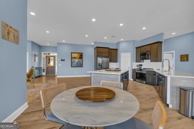 a bed room with a bed and a flat screen tv