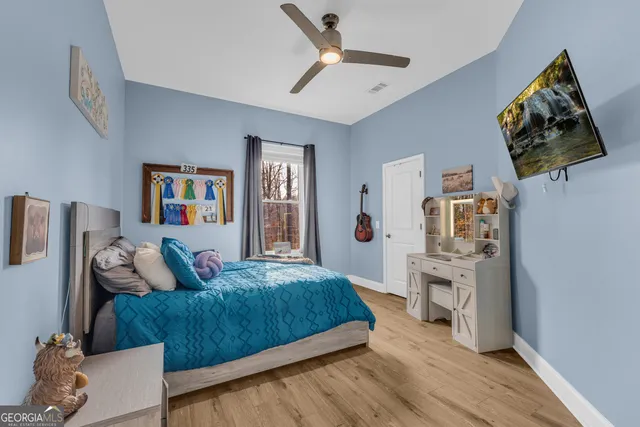 a view of swimming pool with seating space and balcony view