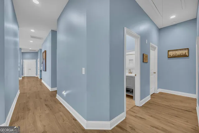 a view of a yard with snow on the road