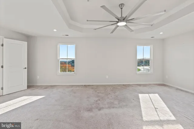a bathroom with a double vanity sink mirror and shower