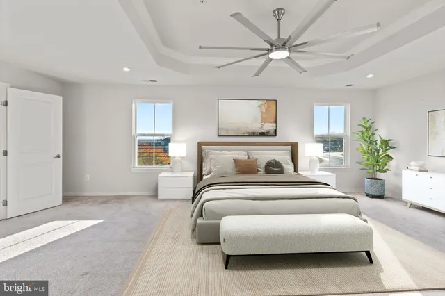 a living room with furniture pool table and a couch