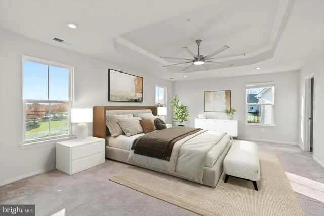 a bathroom with a sink toilet a mirror and shower