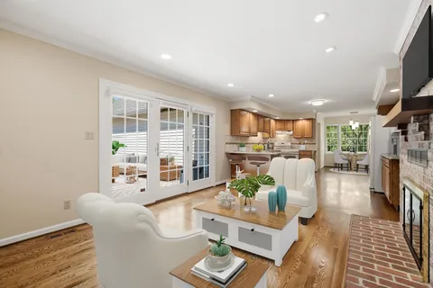 a living room with furniture and a table