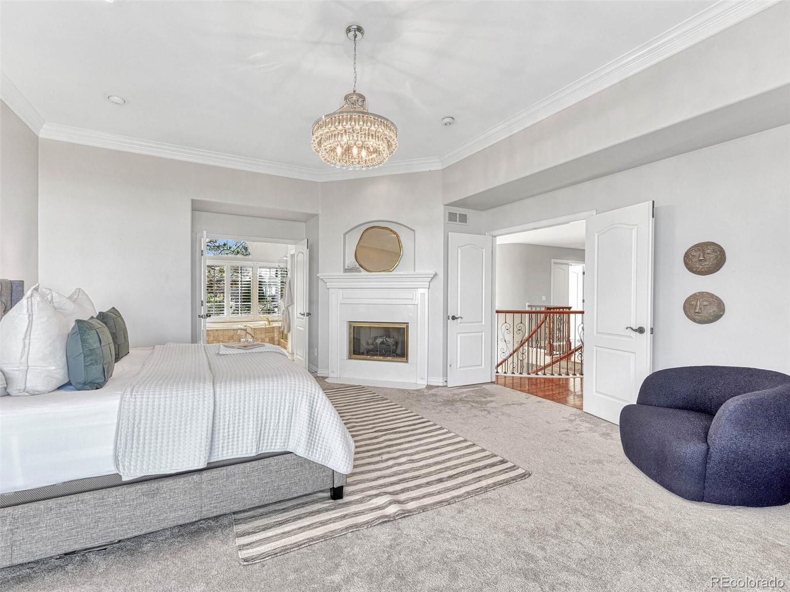 8541 Colonial Drive Lone Tree, CO 80124 - Photo 21 of 45 a bedroom with a bed and a window