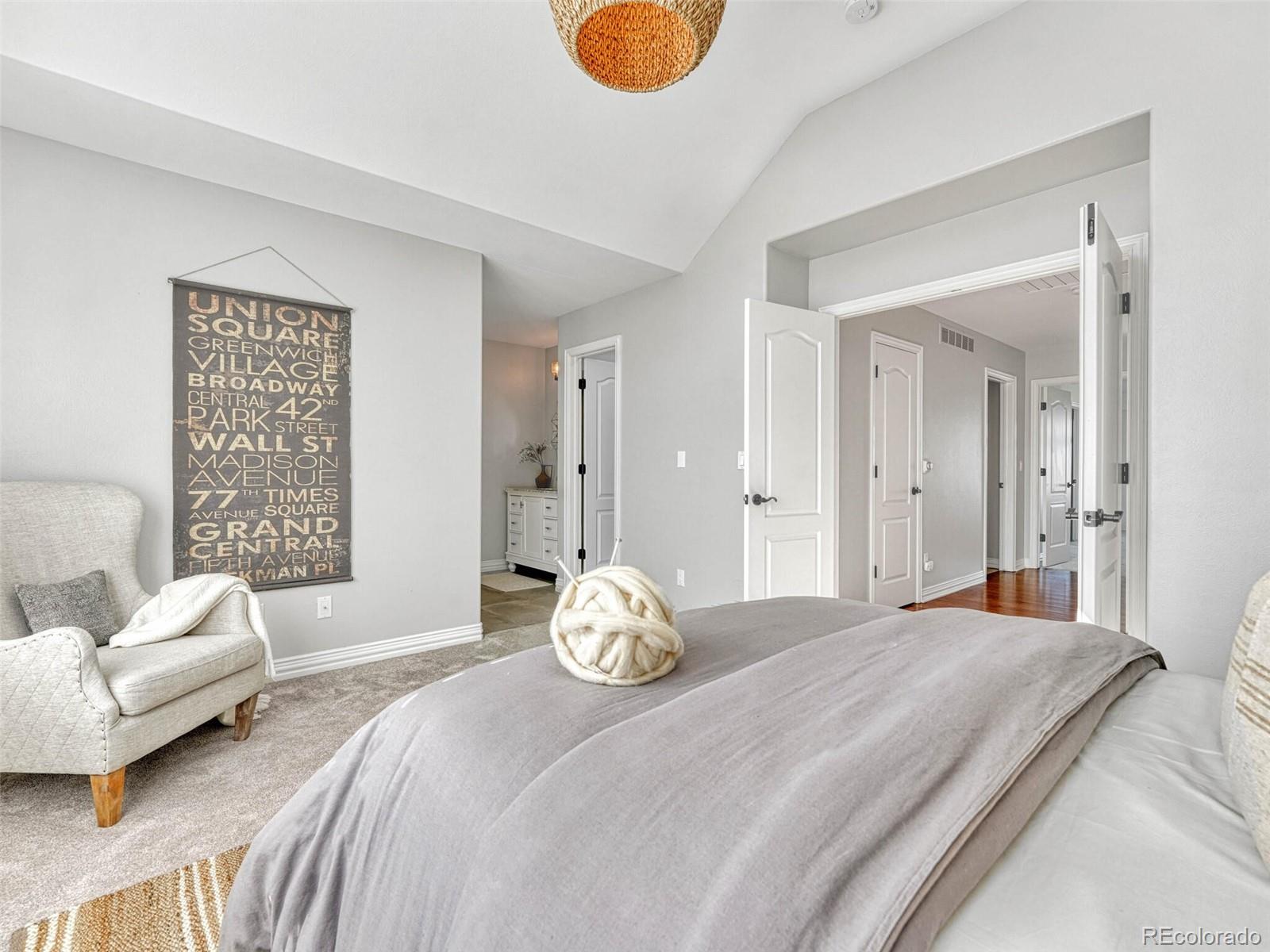 8541 Colonial Drive Lone Tree, CO 80124 - Photo 25 of 45 a bedroom with a bed and window