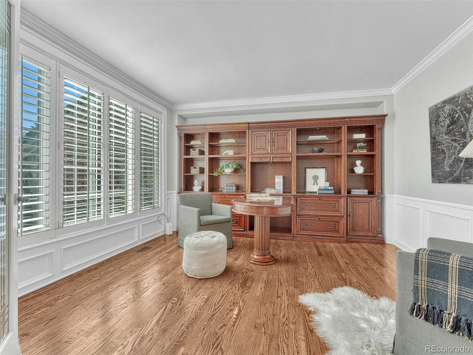 8541 Colonial Drive Lone Tree, CO 80124 - Photo 5 of 45 a living room with furniture and a window