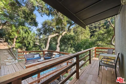 a view of a garden from a balcony