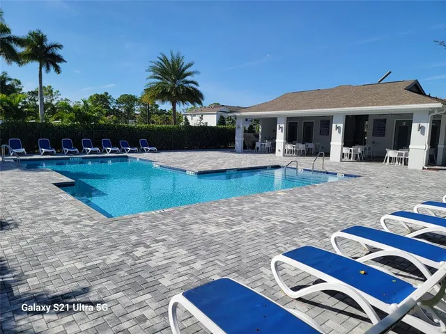 a front view of house with yard and seating area