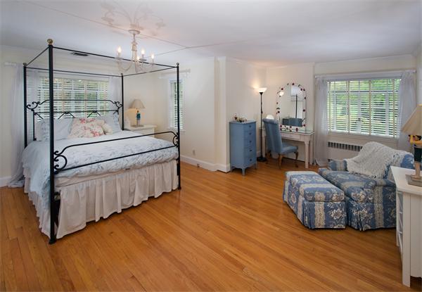 458 Chestnut Street Newton, MA 02468 - Photo 13 of 17 a spacious bedroom with a bed window and walk in closet