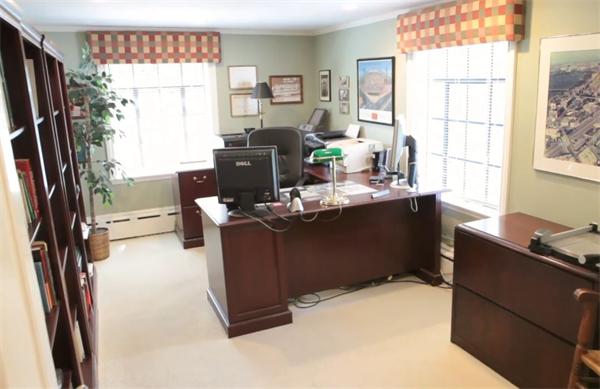 458 Chestnut Street Newton, MA 02468 - Photo 10 of 17 a view of a workspace with furniture and a window