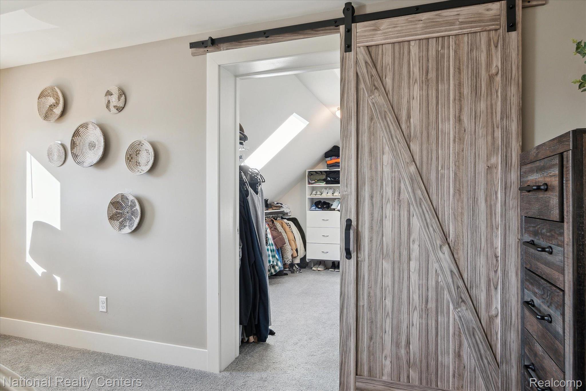 2778 Swarthout Road Pinckney, MI 48169 - Photo 20 of 47 Custom walk-in closet with built-ins and skylight