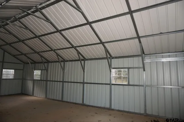 a view of a lake with green space