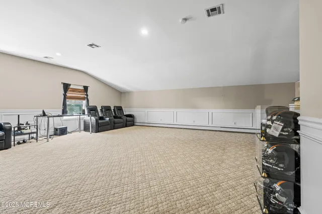 a large white room with bed