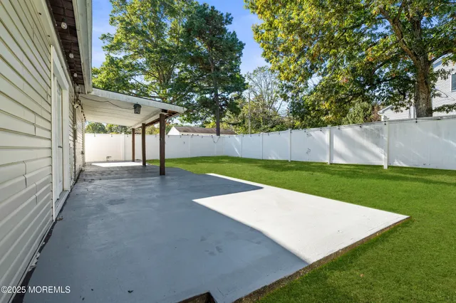 a view of a backyard with a small cabin