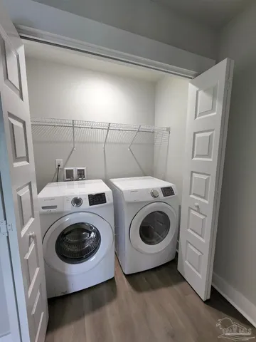 a utility room with dryer and washer