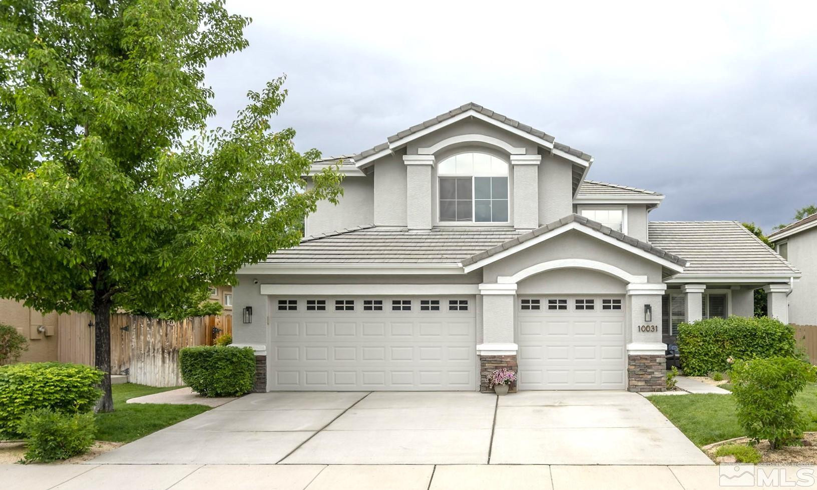 10031 Cascade Falls Drive Reno, NV 89521 - Photo 30 of 30 a front view of a house with garden