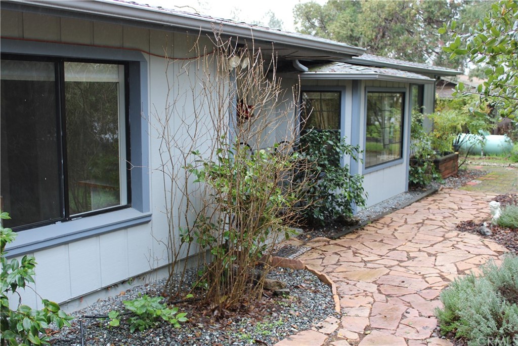 2325 Mill Creek Road Ukiah, CA 95482 - Photo 1 of 1 a front view of a house with garden