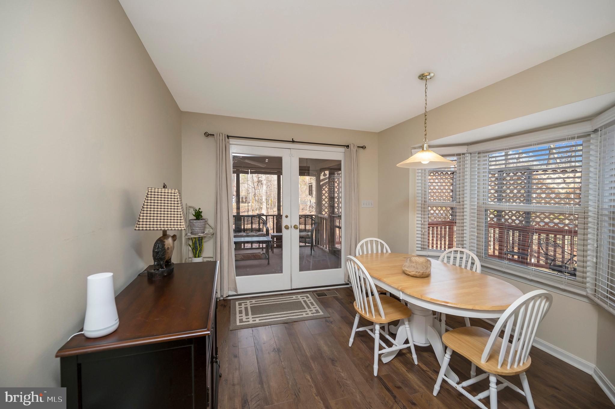 106 Chesterfield Court Locust Grove, VA 22508 - Photo 14 of 59 Dining room leads out to the screened in porch!