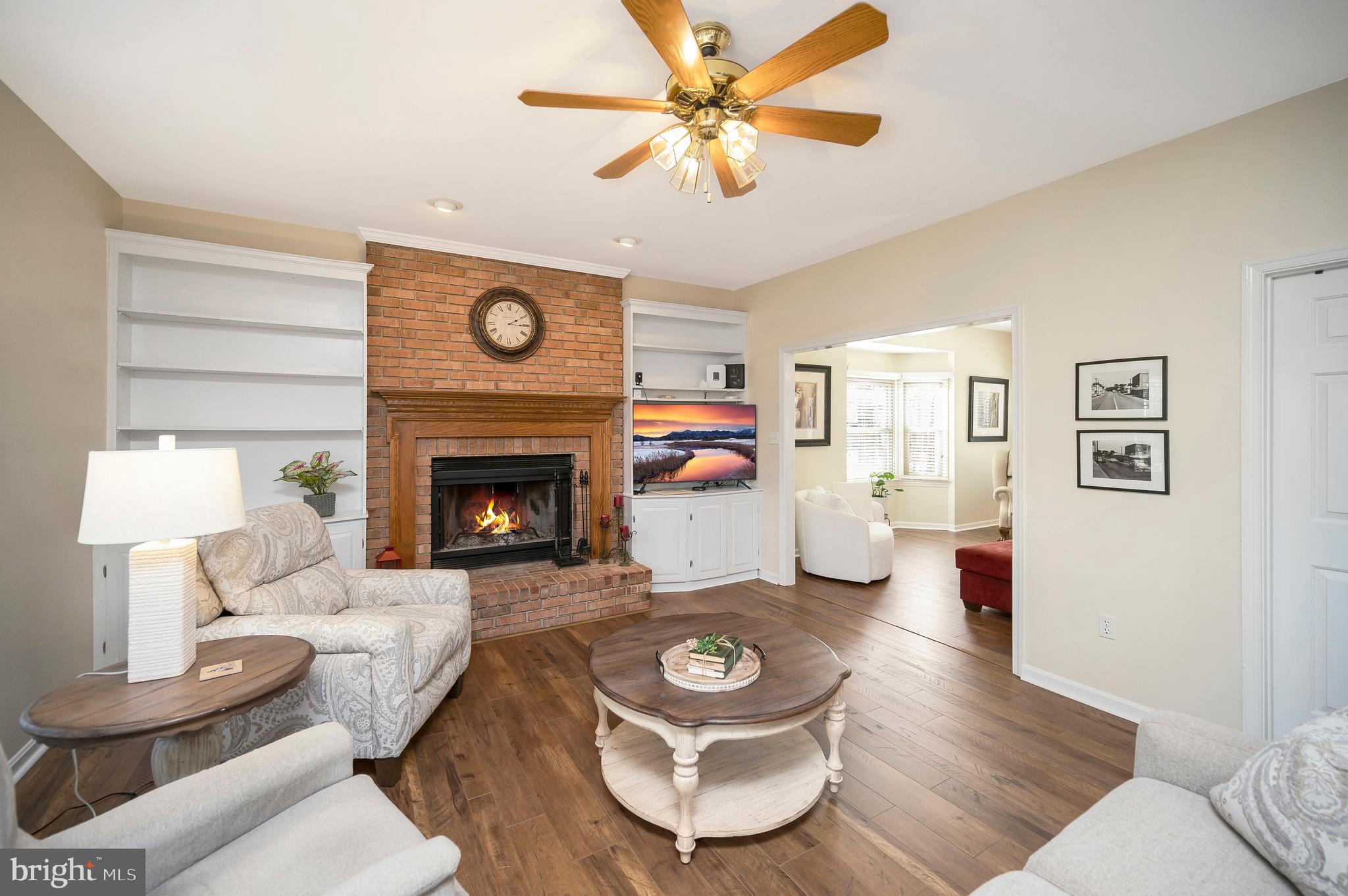 106 Chesterfield Court Locust Grove, VA 22508 - Photo 5 of 59 Formal living room transitions to the living room.