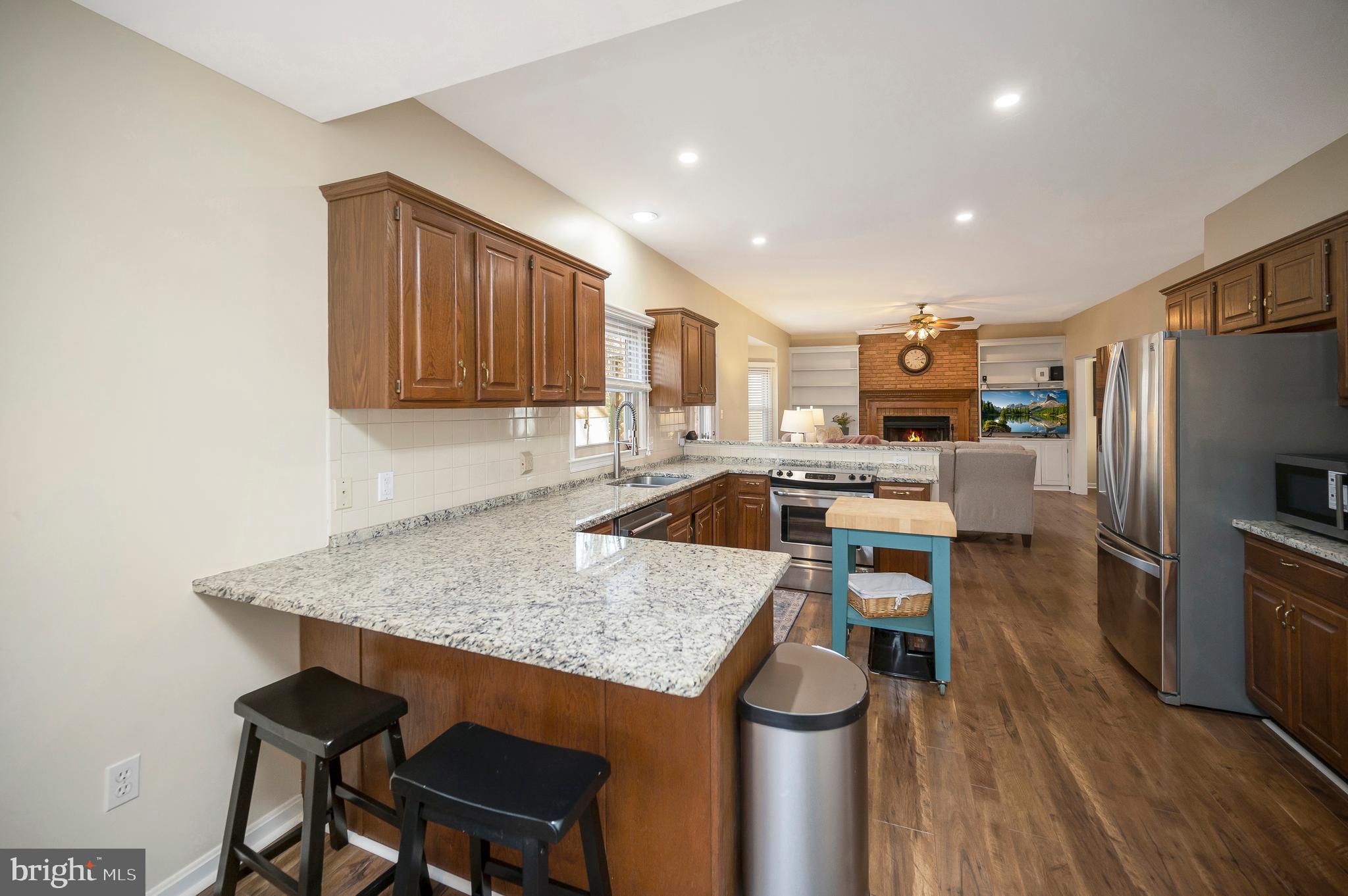 106 Chesterfield Court Locust Grove, VA 22508 - Photo 10 of 59 Additional seating at kitchen bar counter.