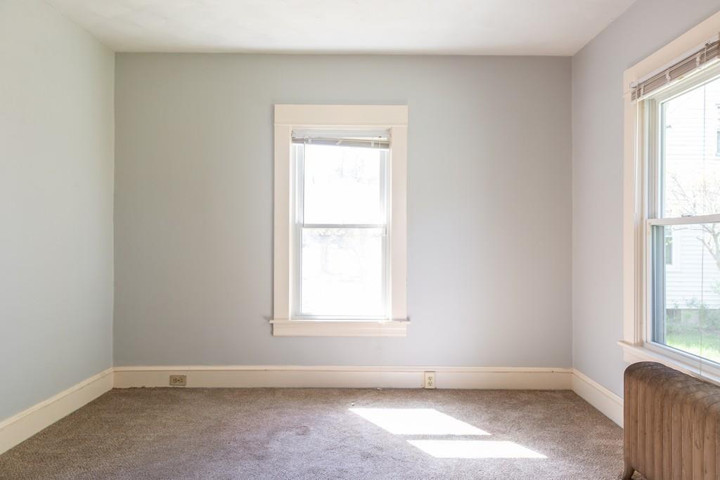 116 Jenness Street Springfield, MA 01104 - Photo 11 of 42 an empty room with windows
