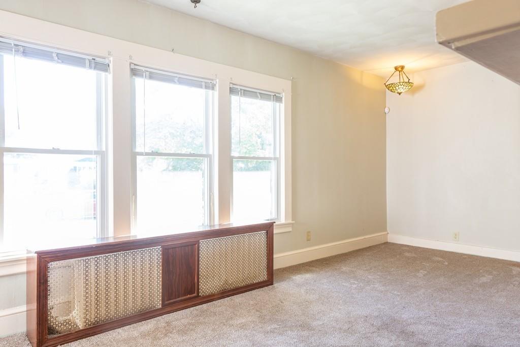 116 Jenness Street Springfield, MA 01104 - Photo 13 of 42 a view of an empty room with a window
