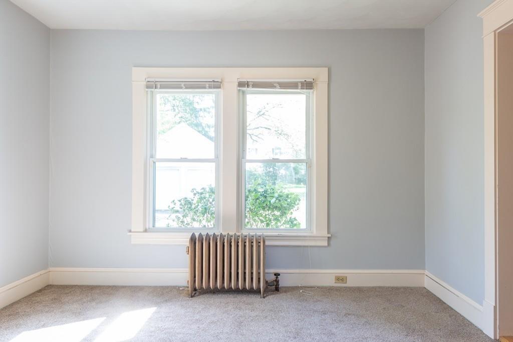 116 Jenness Street Springfield, MA 01104 - Photo 8 of 42 an empty room with windows