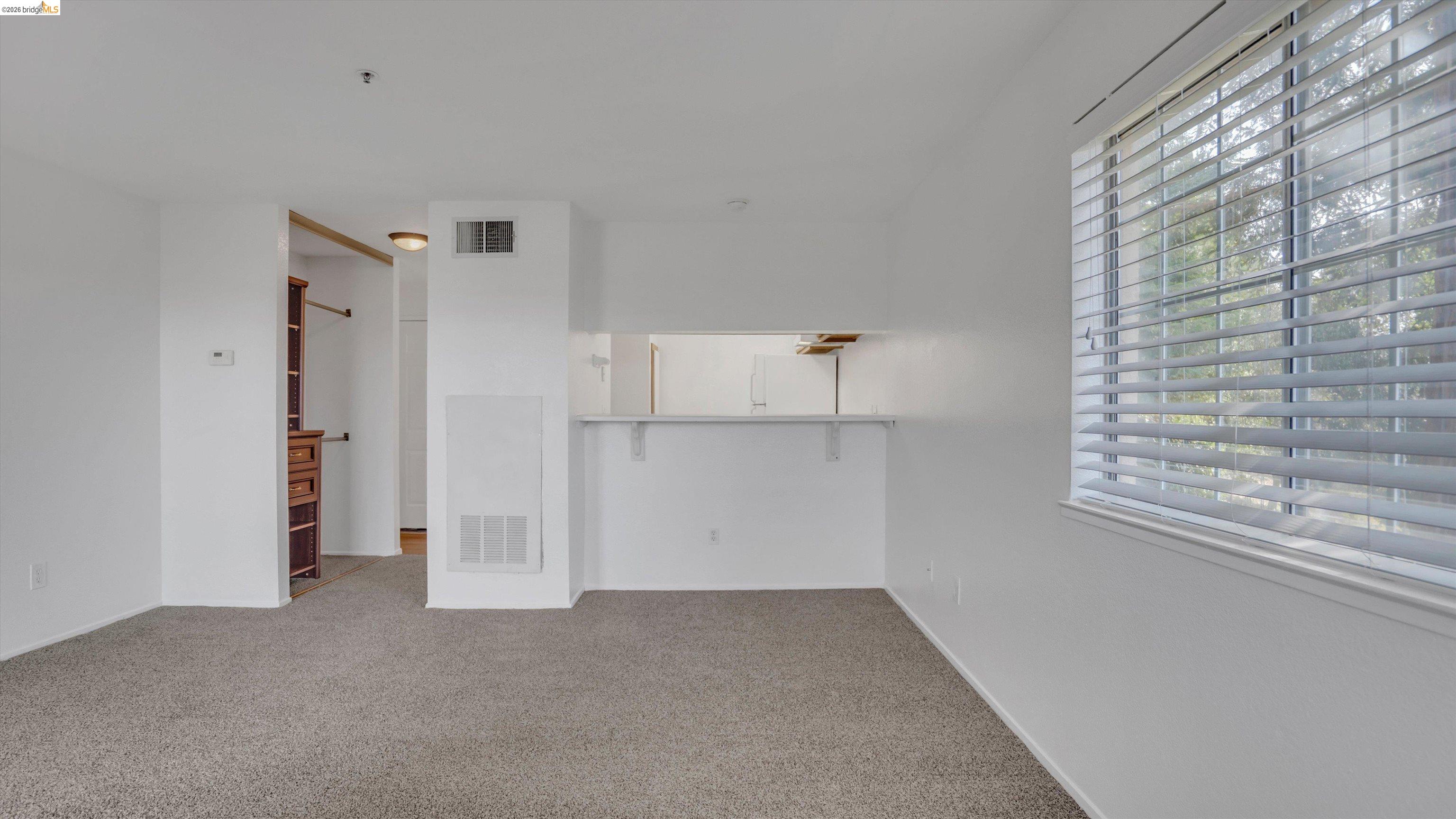 735 Watson Canyon Court, Unit 118 San Ramon, CA 94582 - Photo 11 of 38 a view of empty room with a fireplace