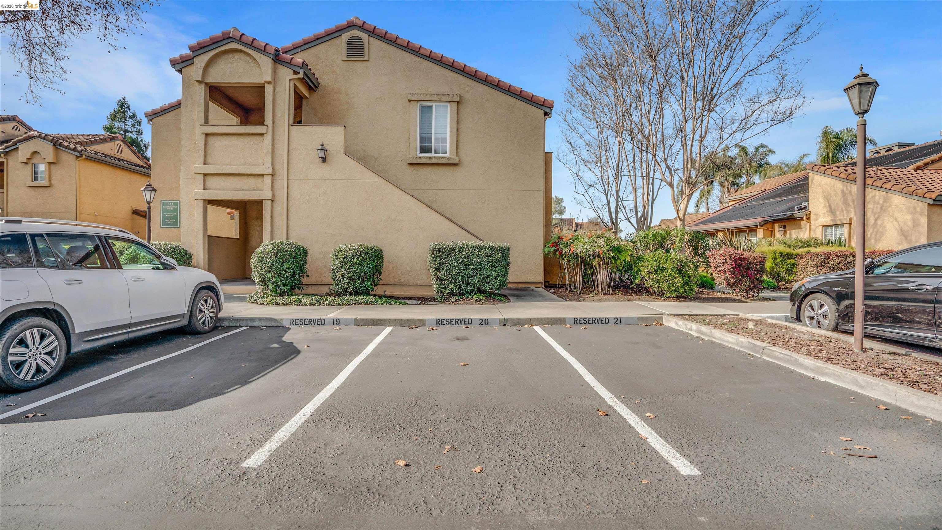 735 Watson Canyon Court, Unit 118 San Ramon, CA 94582 - Photo 25 of 38 a view of a car parked on the side of a street