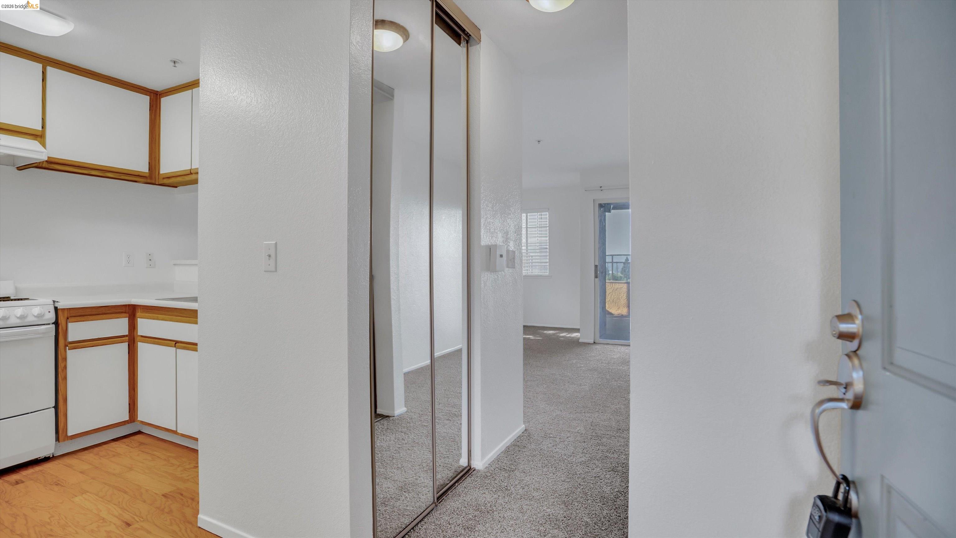 735 Watson Canyon Court, Unit 118 San Ramon, CA 94582 - Photo 3 of 38 a view of a bathroom with mirror