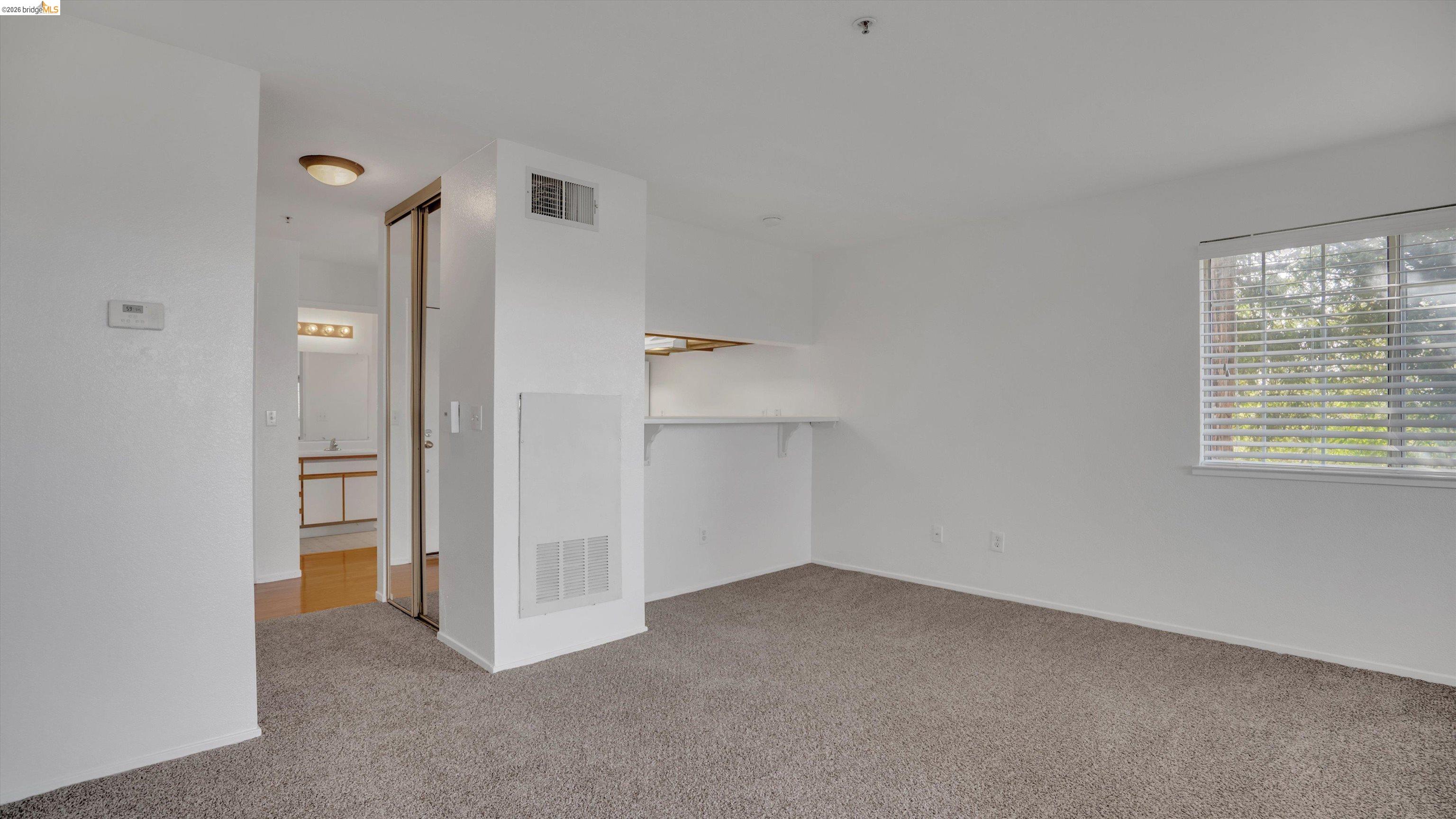 735 Watson Canyon Court, Unit 118 San Ramon, CA 94582 - Photo 9 of 38 a view of an empty room