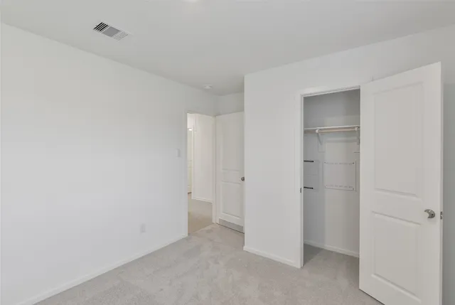 a bathroom with a sink a toilet and vanity