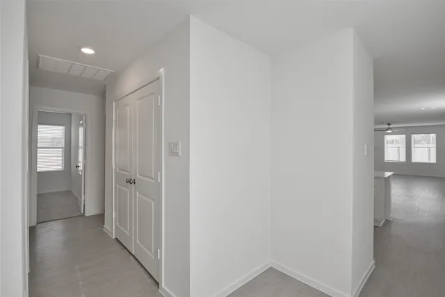 a view of hallway with closet