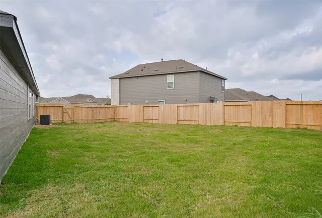 a view of a golf course with a lake