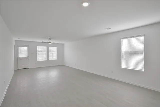 an empty room with windows