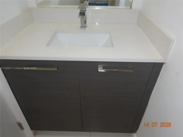 a view of a lake with a yard