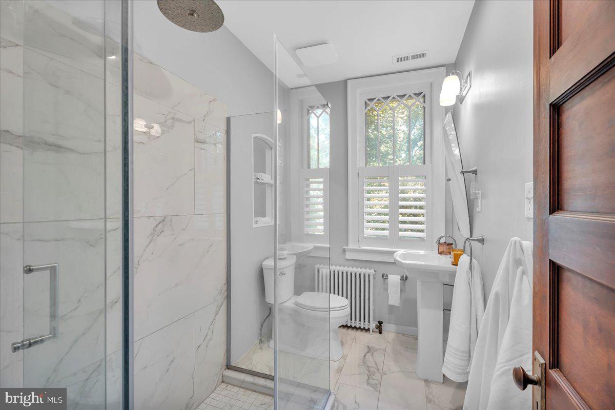 2 Evergreen Lane Haddonfield, NJ 08033 - Photo 15 of 25 a bathroom with a bathtub shower sink and toilet