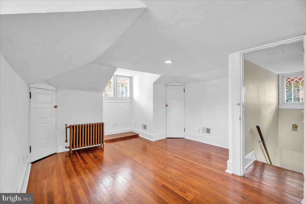 2 Evergreen Lane Haddonfield, NJ 08033 - Photo 16 of 25 an empty room with wooden floor and windows