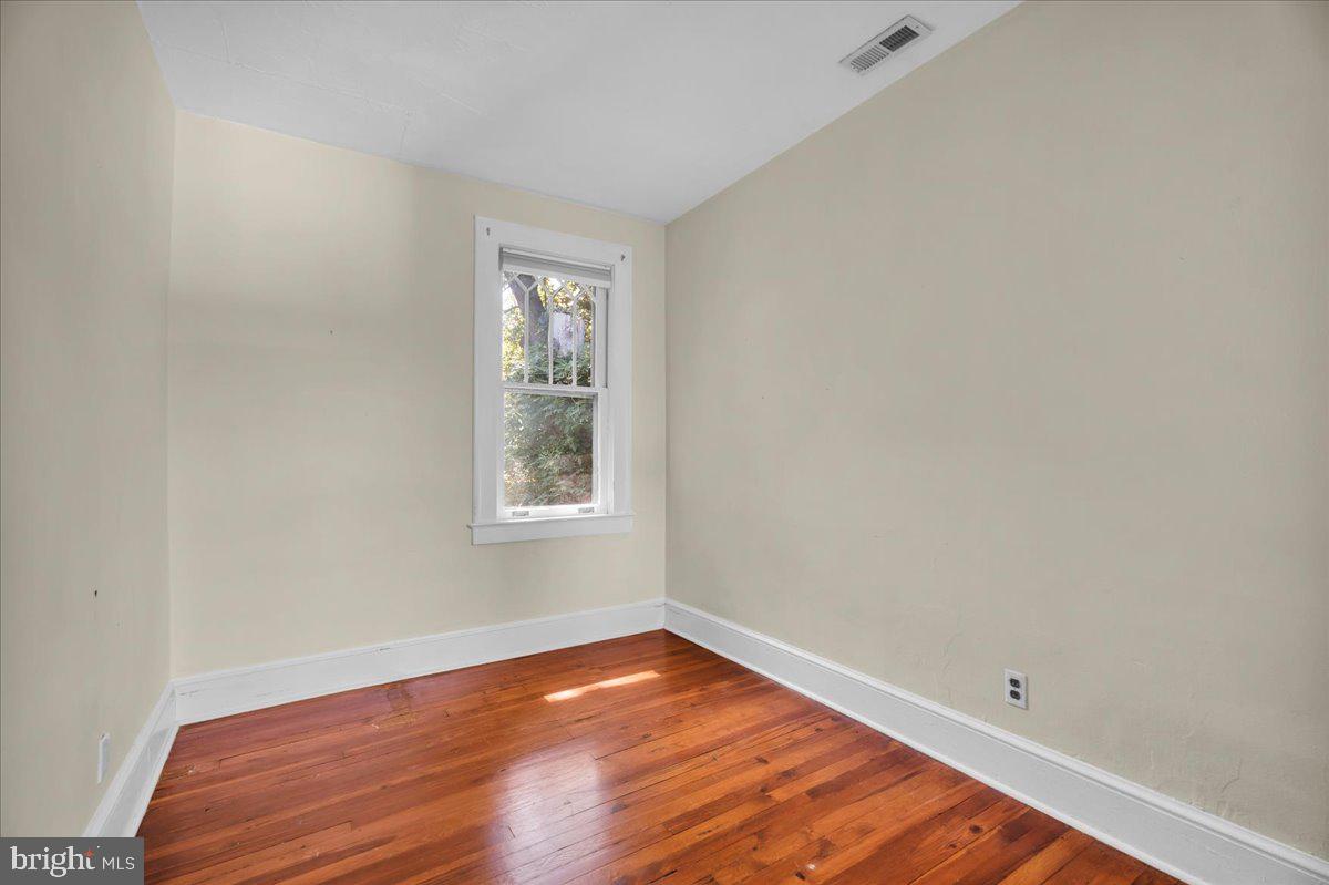 2 Evergreen Lane Haddonfield, NJ 08033 - Photo 17 of 25 an empty room with wooden floor and windows