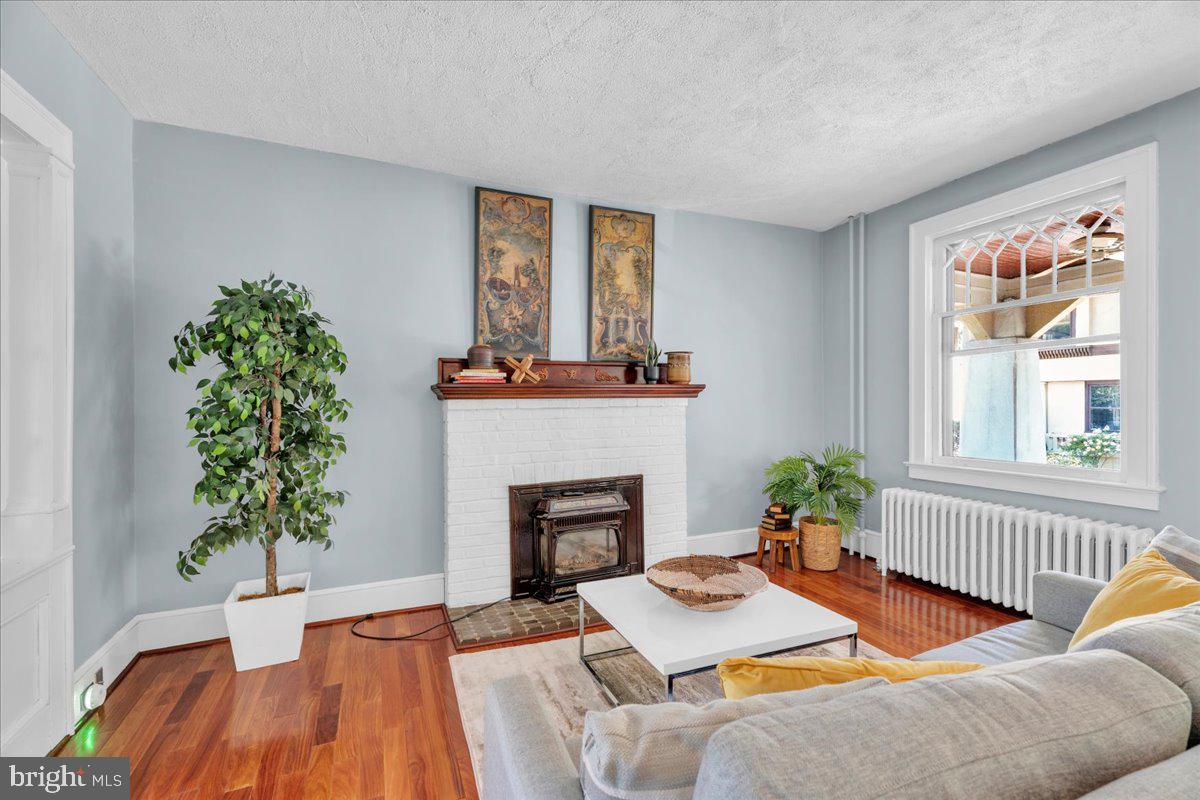 2 Evergreen Lane Haddonfield, NJ 08033 - Photo 7 of 25 a living room with furniture a window and a fireplace