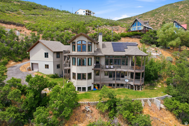 335 Bern Way Midway, UT 84049 - Photo 29 of 88 Multi-level residence featuring extensive balconies, solar panels, and a two-car garage