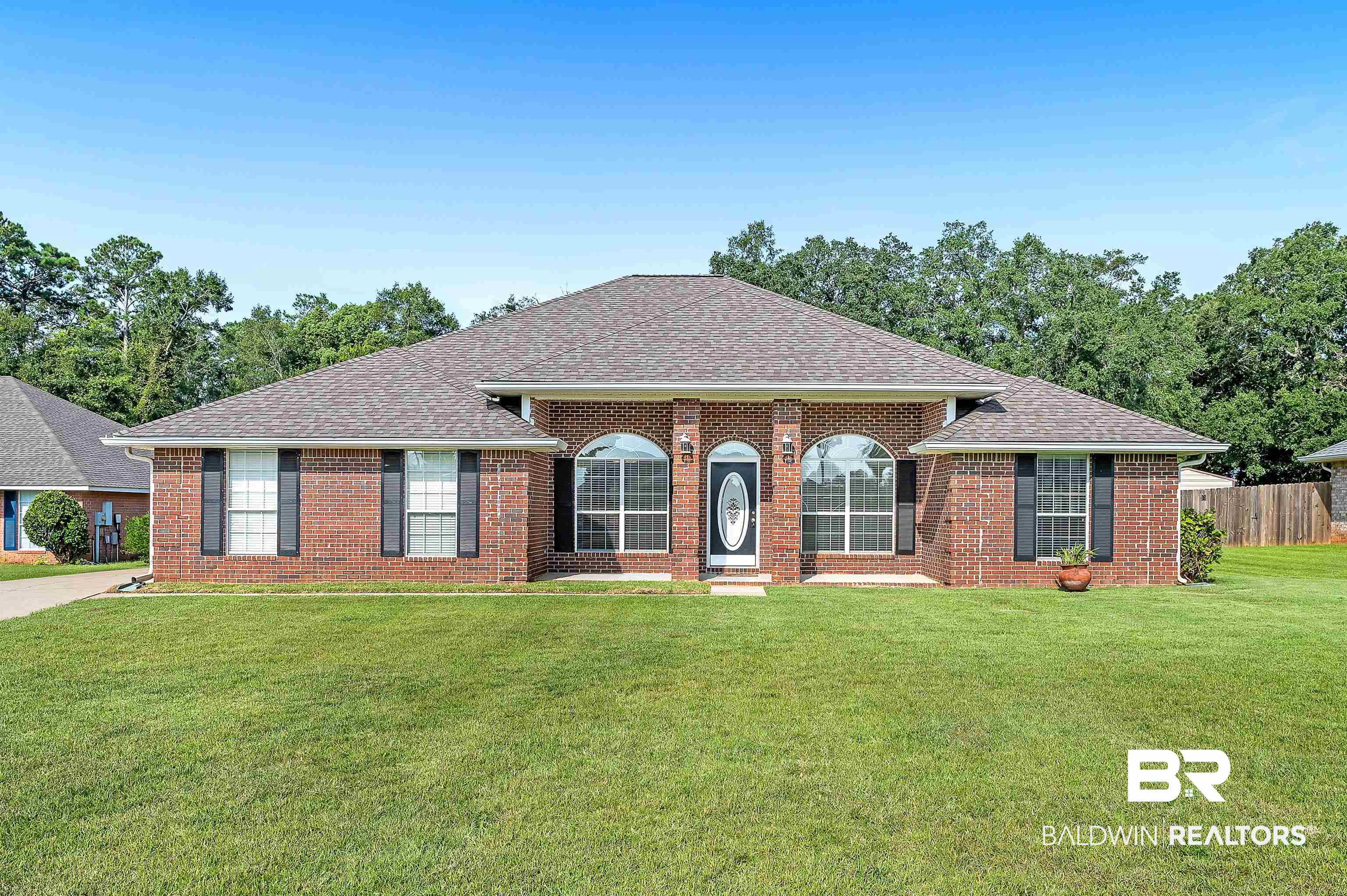 12443 Venice Boulevard Foley, AL 36535 - Photo 1 of 59 Single story home featuring a front lawn