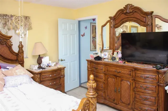 a living room with furniture and flat screen tv