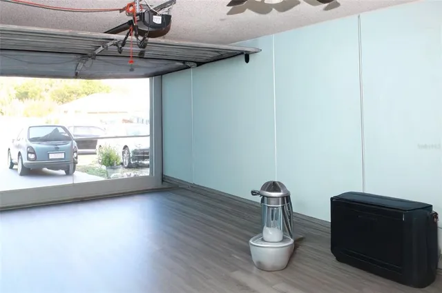 a view of a living room with windows