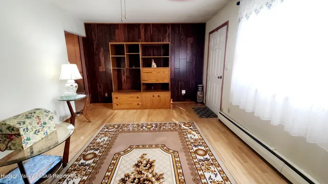 a front view of a house with wooden floor