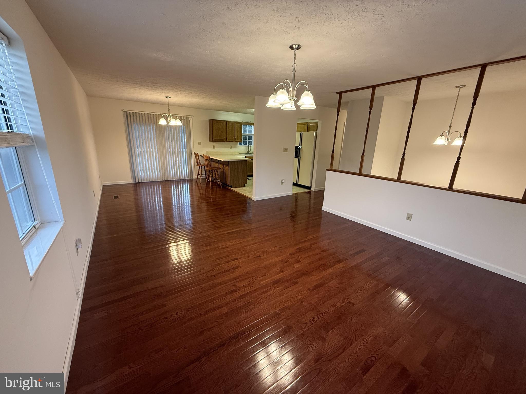 21 Coolidge Road Inwood, WV 25428 - Photo 26 of 80 Open-Concept Living, Dining & Kitchen Area